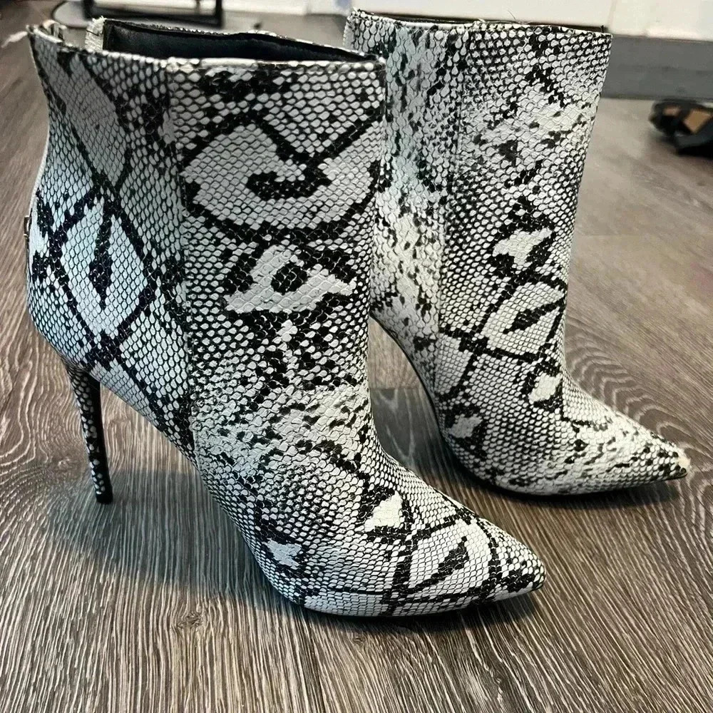 Charlotte Russe snakeskin booties size 7